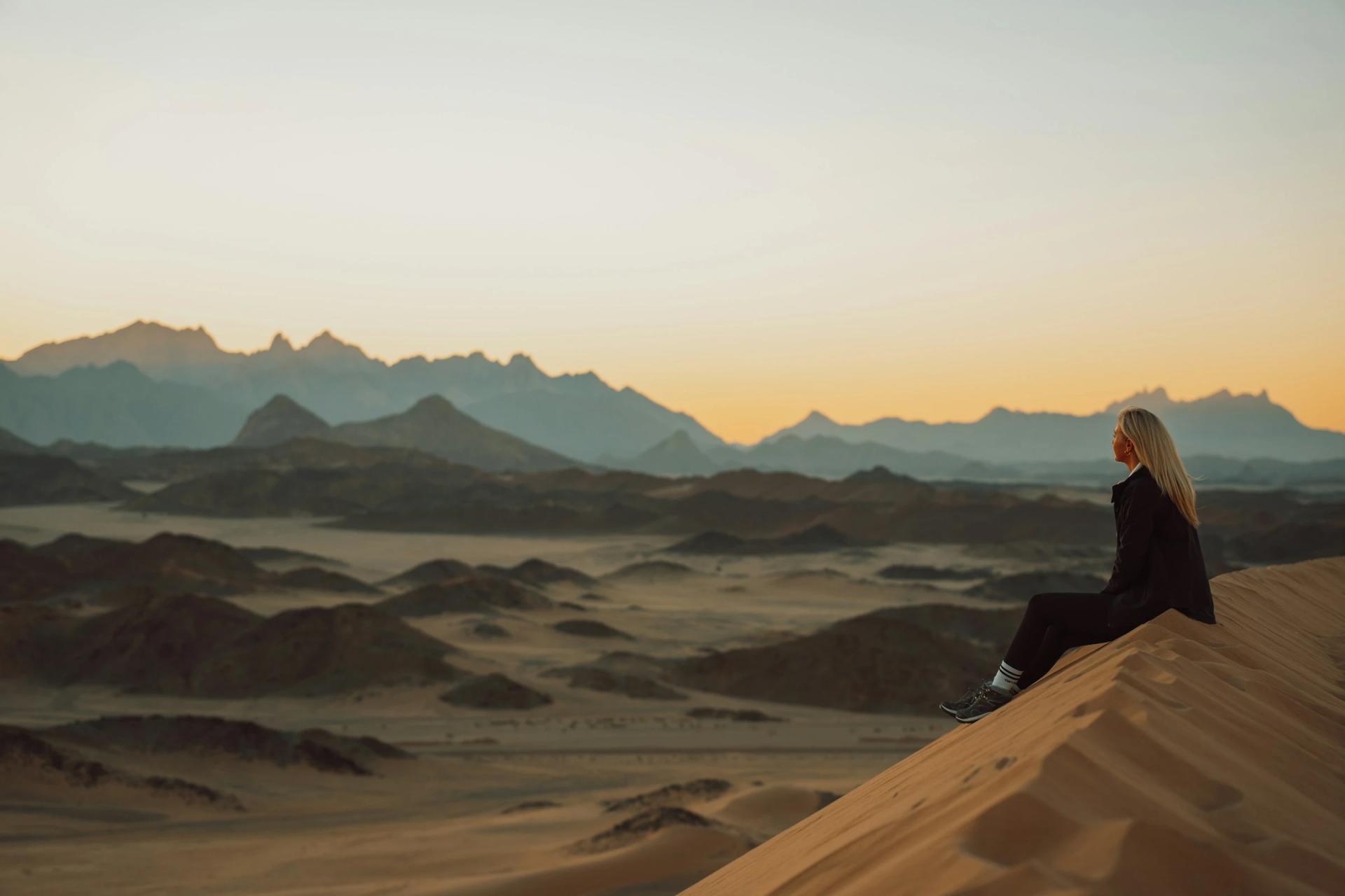 A woman admiring the mountain views at Neom nature reserve in Saudi Arabia