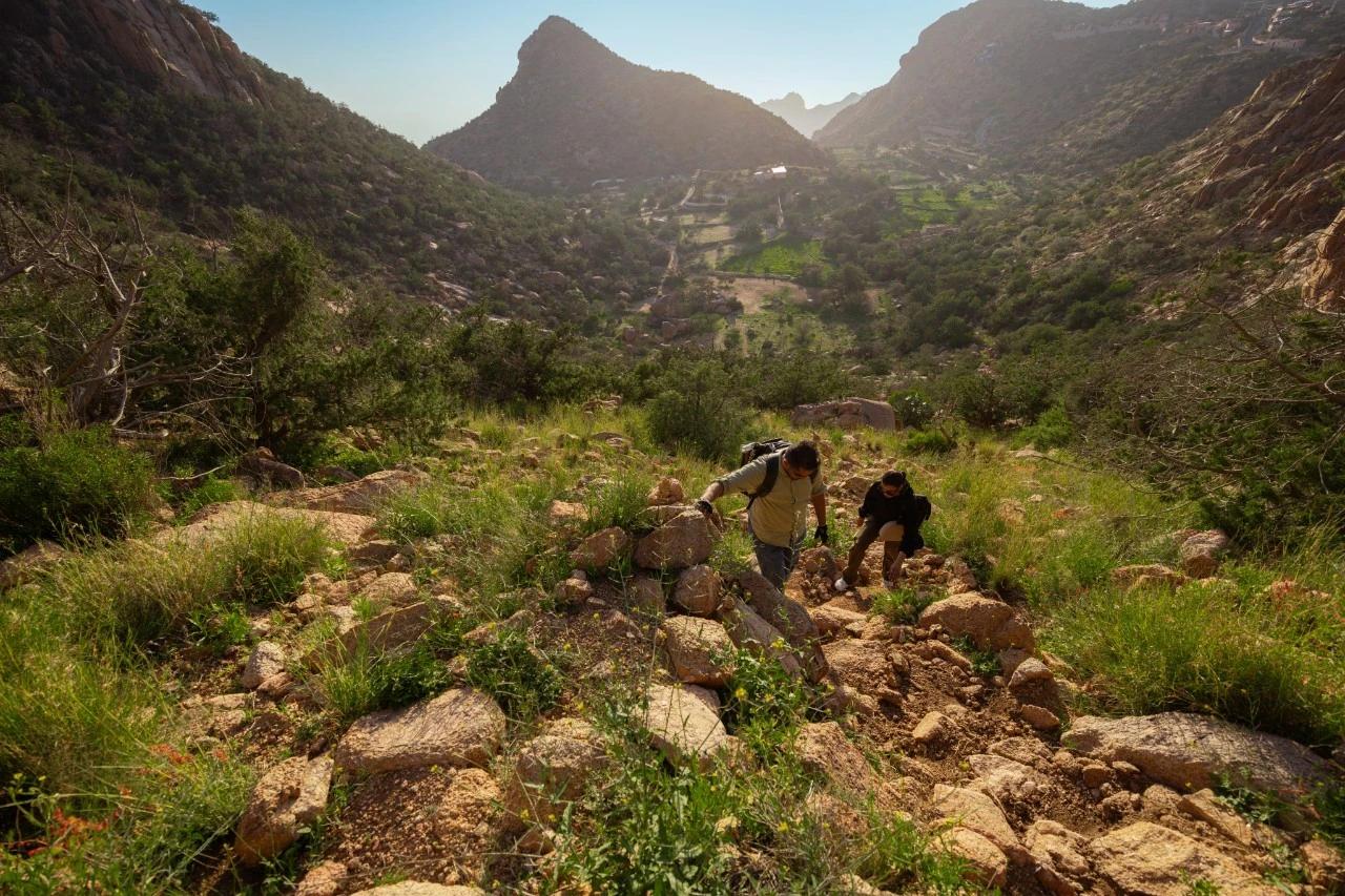 People hiking in the hills of Aseer